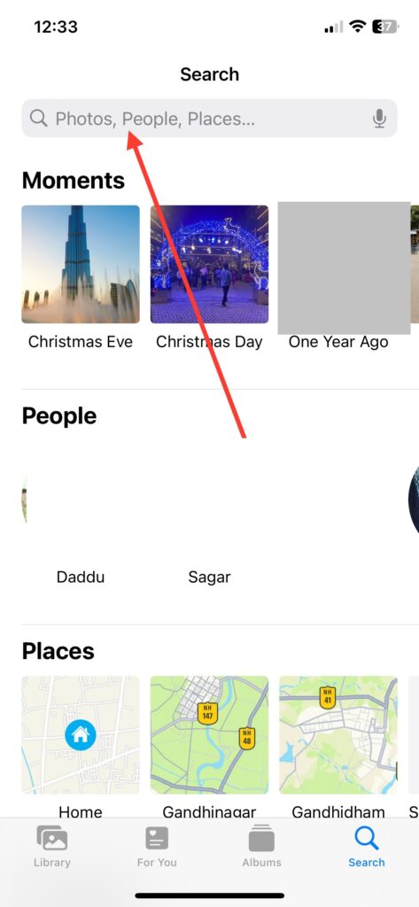 Use the search bar at the top of everything to find your pictures